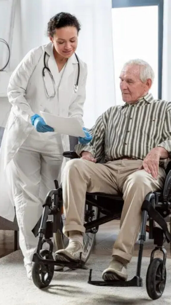 Healthcare professional talking with senior man